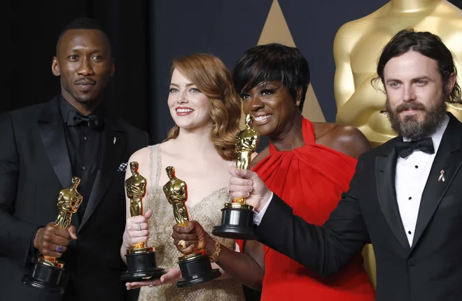 Mahershala Ali (levo) je oskarja dobil že za vlogo v filmu Mesečina. FOTO: Reuters