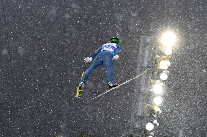 Žiga Jelar je bil odličen tretji po prvem skoku, v drugem pa je zdrsel na 27. mesto. FOTO: AFP