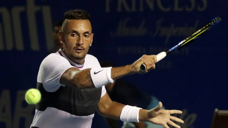 Fotografija: Nick Kyrgios je tokrat spregovoril na igrišču. FOTO: Henry Romero/Reuters