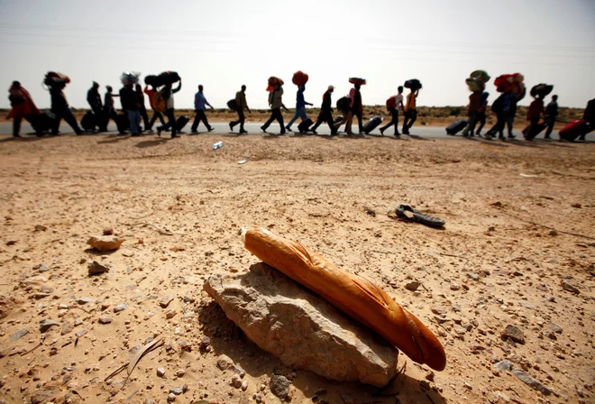 Begunci iz Libije. FOTO: Yannis Behrakis/Reuters