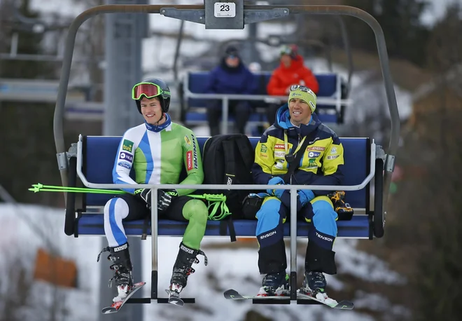 Borut Božič, ki bo drugič tekmoval v svetovnem pokalu, je včeraj vadil v Podkorenu s trenerjem Mitjo Valenčičem. FOTO: Matej Družnik/Delo