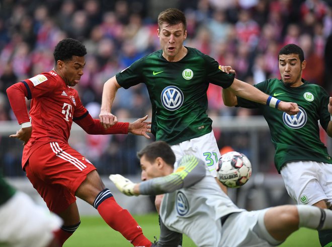 Serge Gnabry je v zadnjih tednih postal eden najbolj vročih Bayernovih igralcev. Proti Wolfsburgu je začel strelski šov Bavarcev. FOTO: AFP