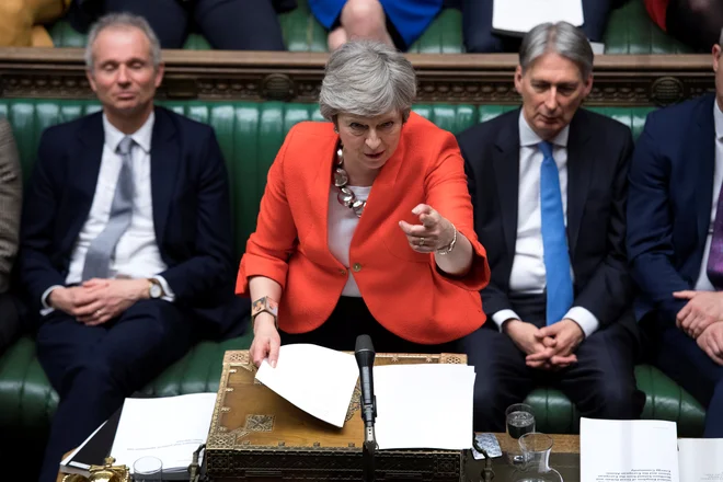 Britanska premierka Theresa May med današnjo razpravo o ločitvenem sporazumu v britanskem parlamentu. FOTO: REUTERS