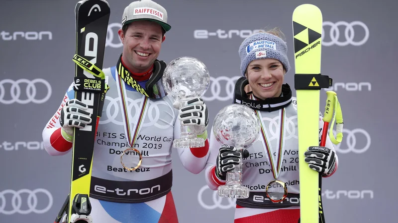 Fotografija: Beat Feuz in Nicole Schmidhofer sta najboljša smukača v sezoni za svetovni pokal. FOTO: Reuters