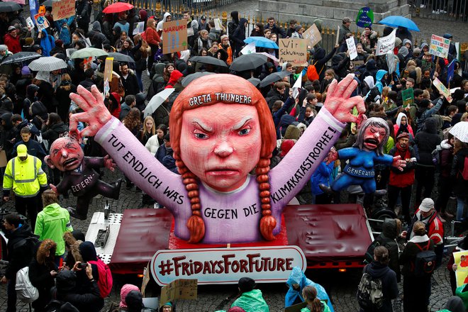 Večno namrgodena začetnica gibanja mladine za boj proti podnebnim spremembam Greta Thunberg je postala prava zvezda. Foto Reuters