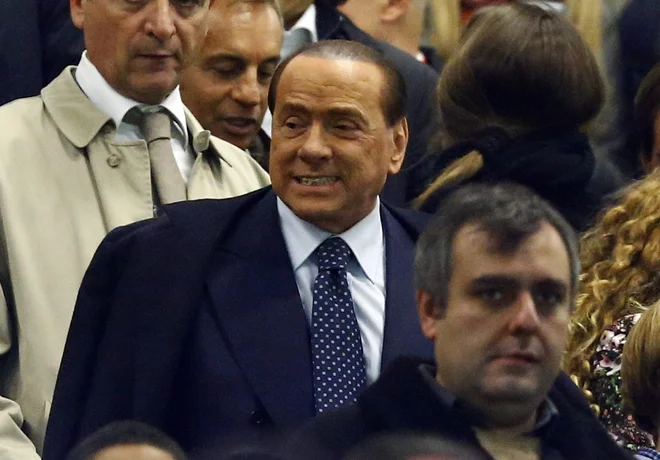 Večkratnega italijanskega premiera so zaradi afere s tedaj mladoletno&nbsp;&raquo;barsko plesalko&laquo; iz Maroka Karimo Mahrug oziroma &raquo;Ruby Rubacuori&laquo;<strong> </strong>obsodili na zapor, a je sodba po pritožbi padla. FOTO: Stefano Rellandini/Reuters