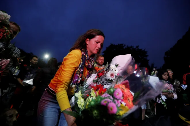 Ljudje so pretreseni. FOTO: Reuters