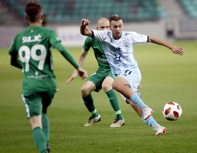 Andrija Filipović (desno) je dokončal veliki zasuk Goričanov, ki jim je gorizl že osmi zapoiredni poraz, nazadnje pa so zmagali prvič letos. FOTO: Roman Šipić/Delo