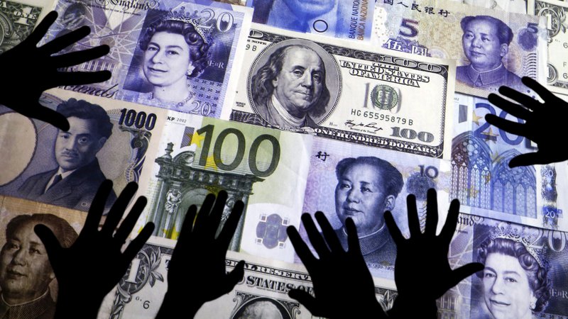 Fotografija: Pri pranju denarja slovenska policija v večini primerov opaža zneske, ki presegajo veliko vrednost, to je 50.000 evrov in več. FOTO: Reuters