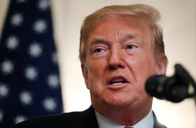 Trumpovo včerajšnje slavje je še dodatno začinila vest, da so aretirali odvetnika Michaela Avenattija, njegovega ostrega kritika.&nbsp; FOTO: Carlos Barria/Reuters