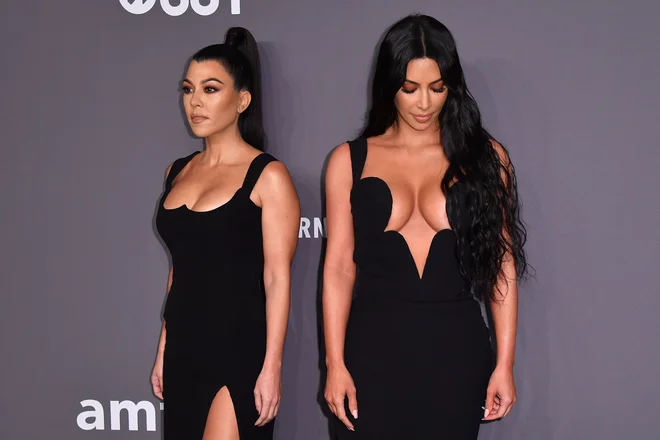 Pripadnice klana Kardashian so za <em>New York Times </em>razkrile, da je šov temelj njihovega imperija. FOTO: Angela Weiss/AFP