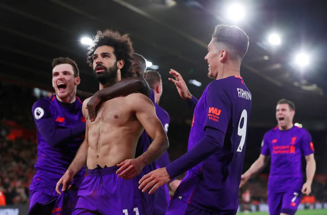 Mohamed Salah je čustveno praznoval odločilni zadetek. FOTO: Reuters