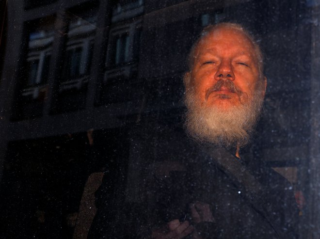 Assange v ZDA obtožen zarote s Chelsea Manning. FOTO: Peter Nicholls/Reuters