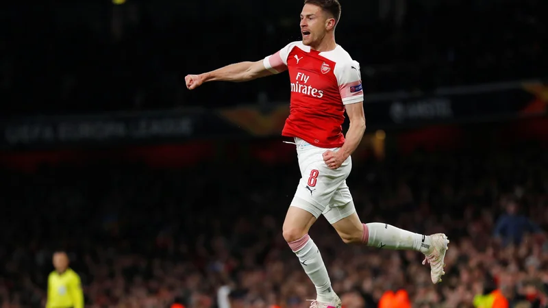 Fotografija: Veselje Arsenalovega vezista Aarona Ramseyja po doseženem golu. FOTO: Reuters