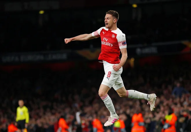 Veselje Arsenalovega vezista Aarona Ramseyja po doseženem golu. FOTO: Reuters