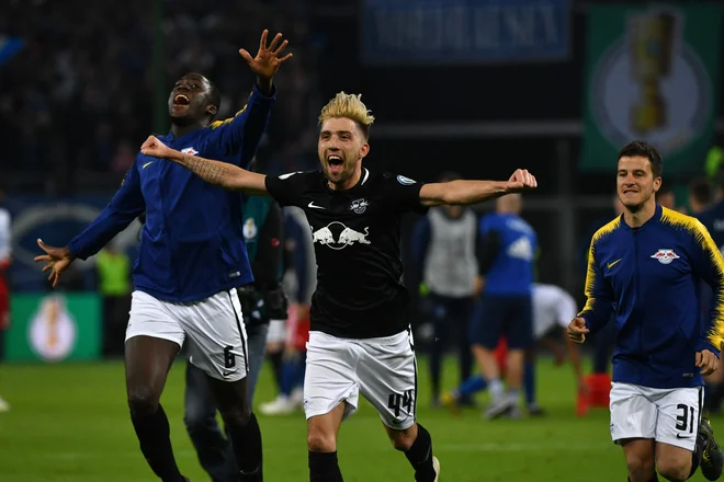 Kevin Kampl je v polfinalu nemškega pokala odigral vidno vlogo v dresu moštva iz Leipziga. FOTO: AFP