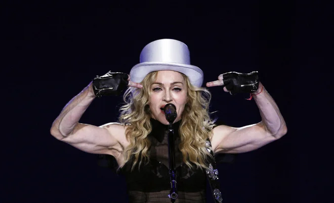 Madonna med koncertom v O2 areni v Londonu leta 2009. FOTO: Luke Macgregor/Reuters