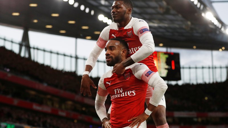 Fotografija: Nogometašem Arsenala se je zaključek sezone v domačem prvenstvu ponesrečil, vtis so popravili v evropski ligi. FOTO: Reuters
