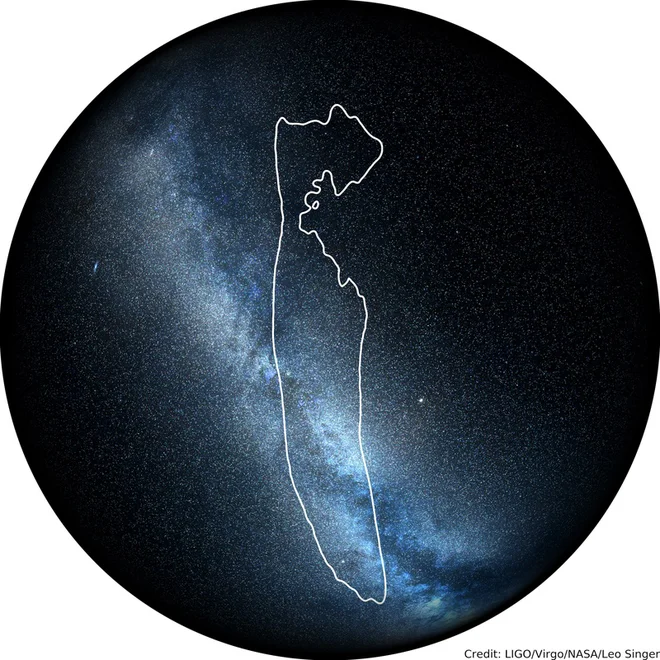 Obkroženo je območje, od koder je prišel šibek signal zlitja črne luknje in nevtronske zvezde. Območje so zožali na tri odstotke celotnega neba. FOTO: LIGO/Virgo/NASA/Leo Singer (Slika Rimske ceste: Axel Mellinger)&nbsp;