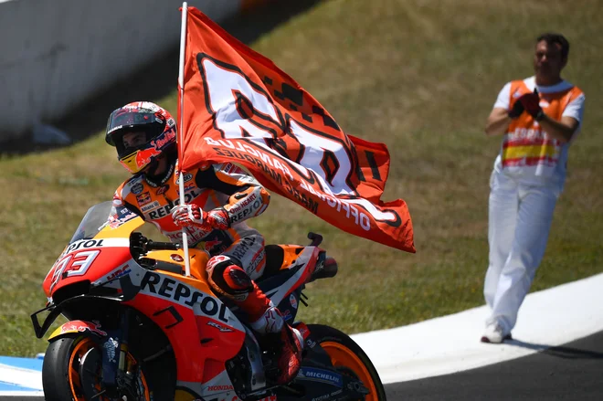 Marc Marquez se je veselil domače zmage. FOTO: AFP