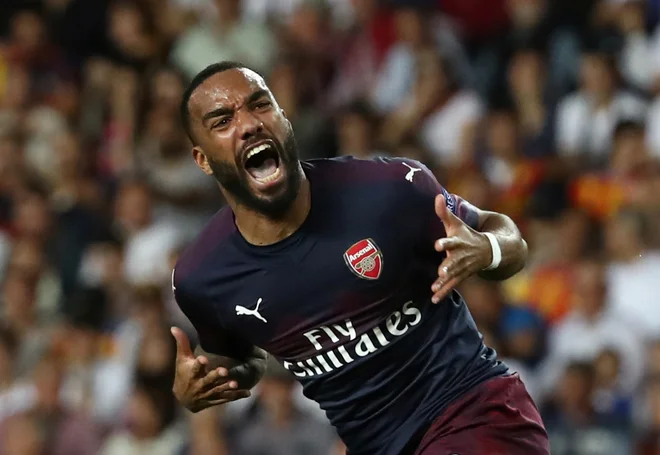 Alexandre Lacazette in Aubameyang sta v zaključku sezone v izvrstni formi. FOTO: Reuters