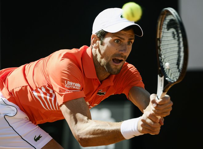 Novaku Đokoviću sta četrtfinalni in polfinalni dvoboj pobrala preveč moči. FOTO: AFP