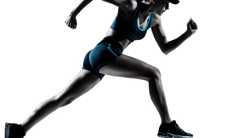 Fotografija: one caucasian woman runner jogger running in silhouette studio isolated on white background