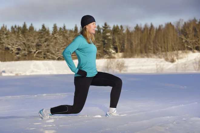 Mature woman exercising in winter