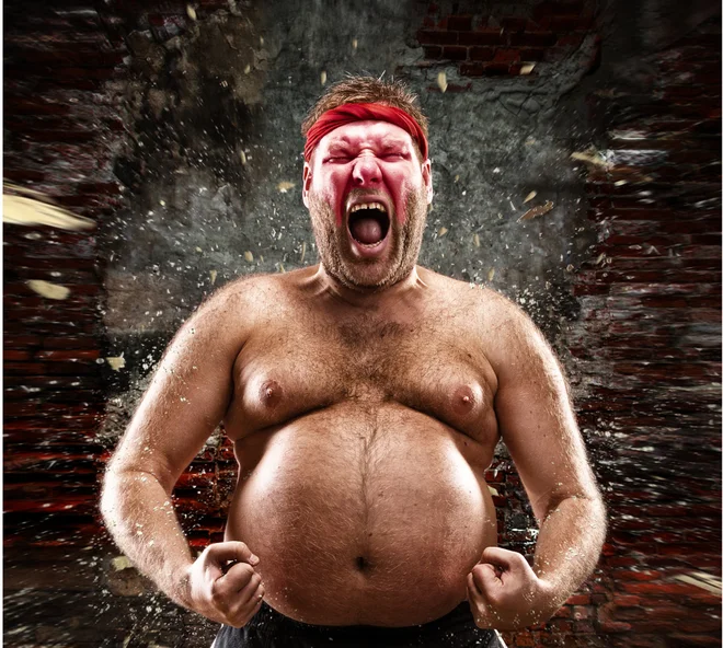 Furious man screams against blow