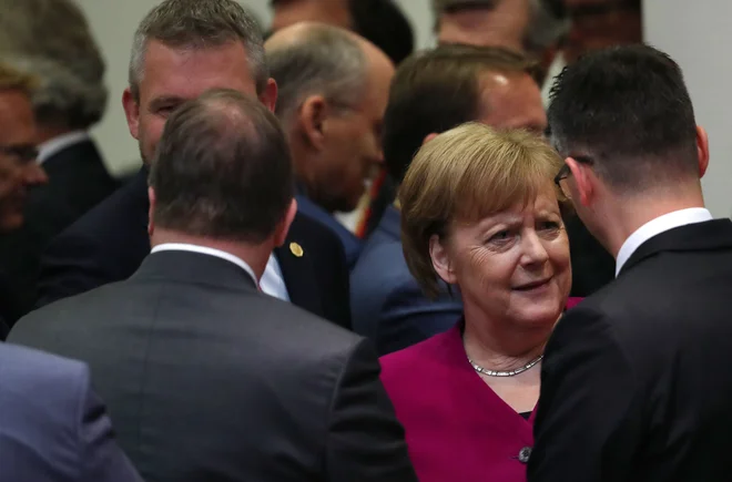 Tako kot pri drugih odločitvah bo nemška kanclerka Angela Merkel imela ključno vlogo tudi pri izbiranju ljudi za vodilne položaje v EU. FOTO: Francisco Seco/AFP