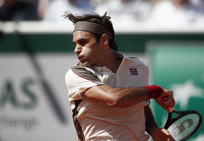 Roger Federer je poskrbel za nov mejnik v tenisu: kot prvi je odigral 400 dvobojev na velikih slamih. FOTO: Reuters
