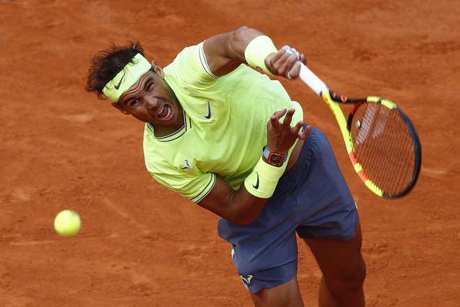 Kadar se je doslej Rafael Nadal na Roland-Garrosu prebil v polfinale, je turnir tudi osvojil. FOTO: Reuters