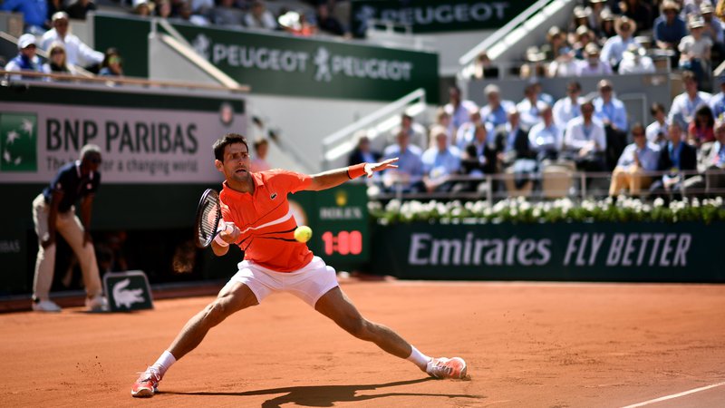 Fotografija: Novak Đoković se je prvič po letu 2016 spet prebil v polfinale Roland-Garrosa, v petih dvobojih pa ni izgubil niza. FOTO: AFP
