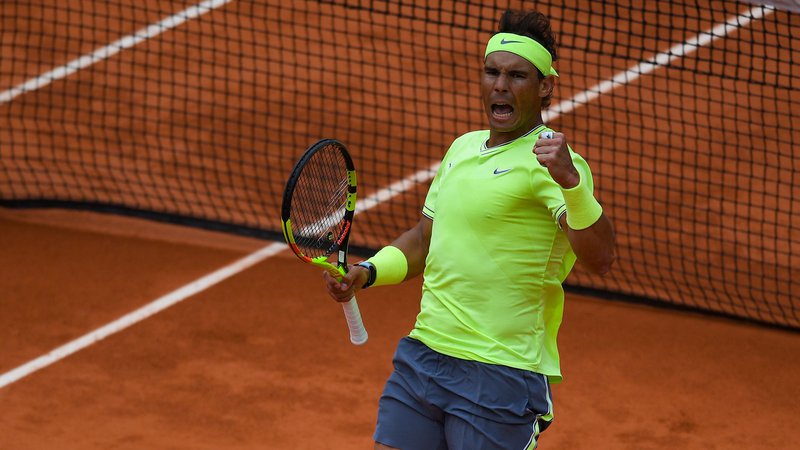 Fotografija: Rafael Nadal v Roland-Garrosu proti Rogerju Federerju ne pozna poraza. Dobil je še šesti medsebojni dvoboj. Foto AFP
