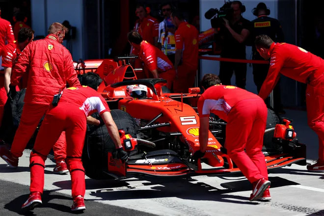 Prvouvrščeni Sebastian Vettel. FOTO: Dan Istitene Afp