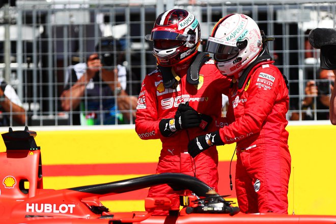 Sebastian Vettel in tretjeuvrščeni Charles Leclerc FOTO: Dan Istitene/Afp