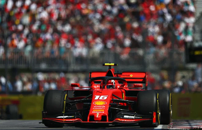 Charles Leclerc se je veselil tretjega mesta. FOTO AFP