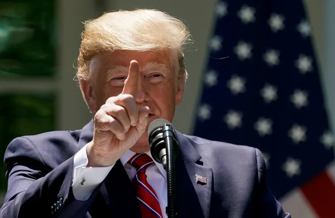 Ameriški predsednik Donald Trump med tiskovno konferenco s poljskim predsednikom Andrzejem Dudo. FOTO: Reuters<br />