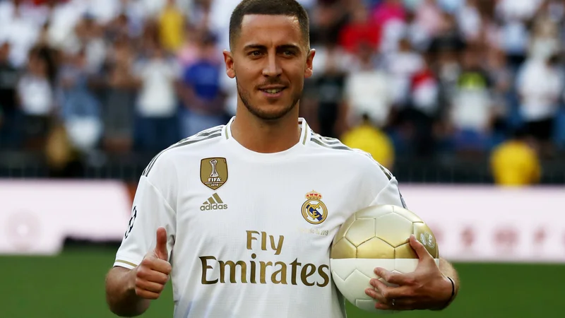 Fotografija: Eden Hazard ob prihodu v Madrid ni skrival dobre volje. FOTO Reuters