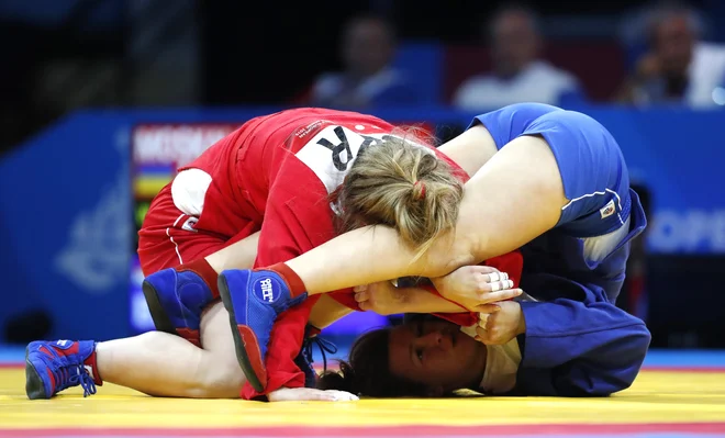 Borilni športi so tudi zaradi svoje pomembne vloge v dražvah nekdanje Sovjetske zveze paradni konji evropskih iger v Minsku. FOTO: Reuters