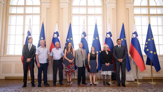 Fotografija: Nagrajeni prostovoljci pri predsedniku republike. FOTO: Urad predsednika republike