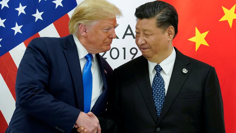 Fotografija: Donald Trump in Xi Jinping. FOTO: Reuters