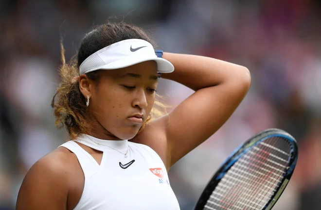 Naomi Osaka je wimbledonski nastop končala že v 1. kolu. FOTO: Reuters