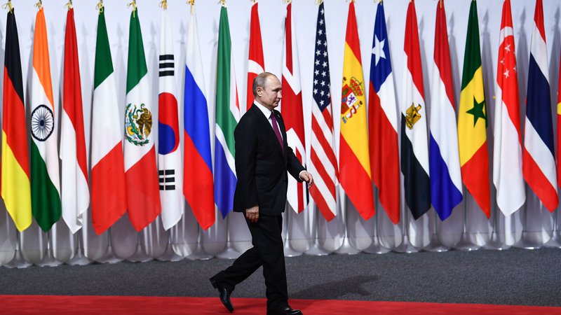 Fotografija: Ruski predsednik Vladimir Putinna vrgu G20 v Osaki.
FOTO: Afp