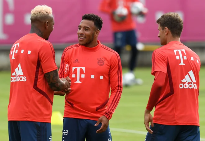Jerome Boateng, Corentin Tolisso in Thomas Müller so bili za začetek priprav dobre volje. FOTO AFP