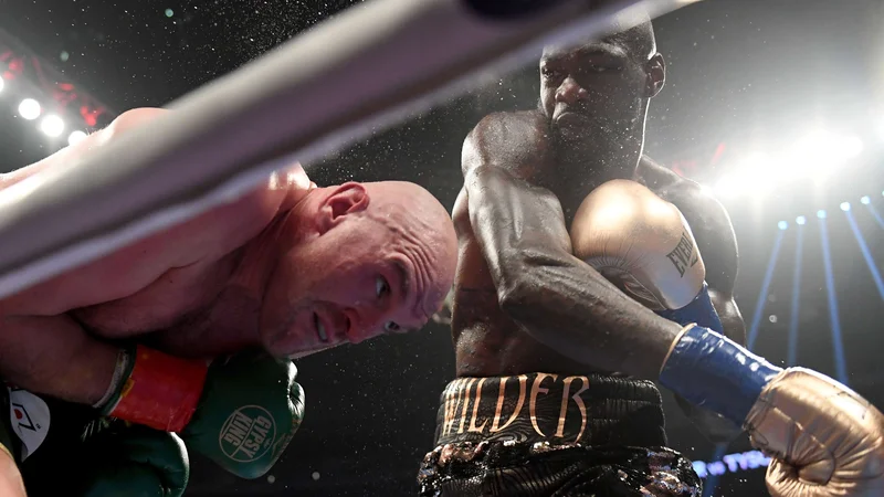 Fotografija: Tyson Fury (levo) in Deontay Wilder bosta še enkrat prekrižala pesti. FOTO: AFP