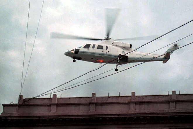 Najbolj je znan po tem, da je leta 2001, ko je bila Argentina v najhujši gospodarski krizi, s helikopterjem pobegnil iz predsedniške palače. FOTO: Marcelo Capece/AFP
