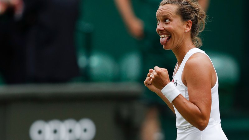 Fotografija: Czech Republic's Barbora Strycova celebrates beating Britain's Johanna Konta during their women's singles quarter-final match on day eight of the 2019 Wimbledon Championships at The All England Lawn Tennis Club in Wimbledon, southwest London, on July 9, 2019. (Photo by Adrian DENNIS / AFP) / RESTRICTED TO EDITORIAL USE
