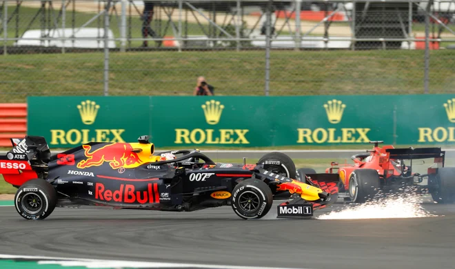 Sebastian Vettel se je zaletel v Maxa Verstappna. FOTO: Reuters