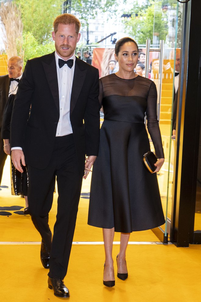 Britanski princ Harry in vojvodinja Meghan sta poskrbela za dodatni blišč britanske premiere <em>Levjega kralja</em>. FOTO: AFP